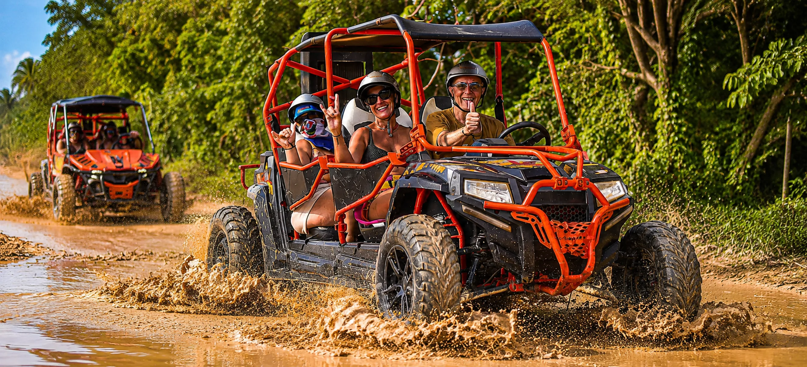 Family enjoying a Wild Trails Buggies UTV adventure through muddy off-road trails in Punta Cana, Dominican Republic.